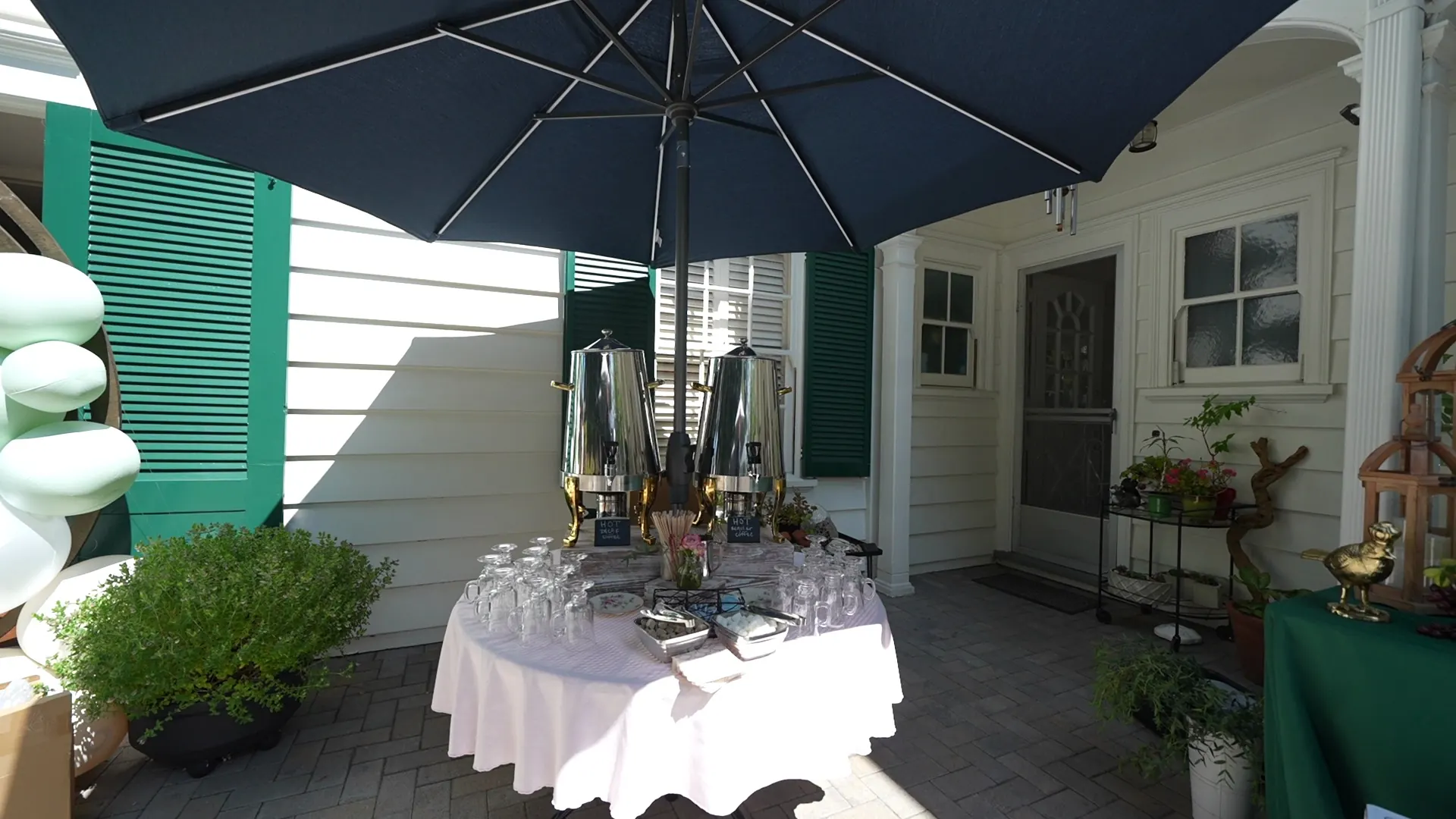 Shaded buffet table set up beside the house at a Marin County wedding reception