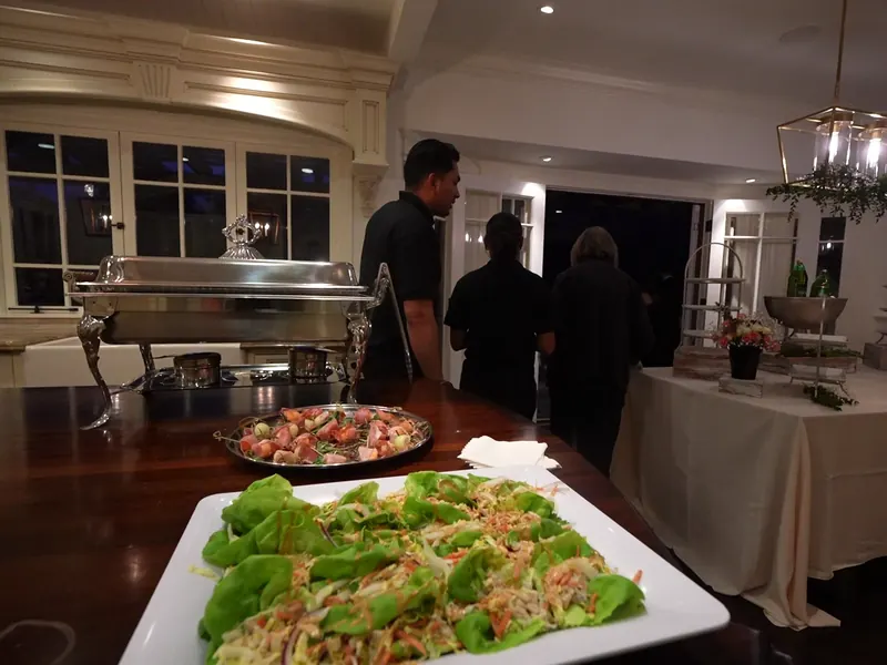 Platter of fresh appetizer wraps plated on a kitchen island at a Novato Ignacio-area office lunch
