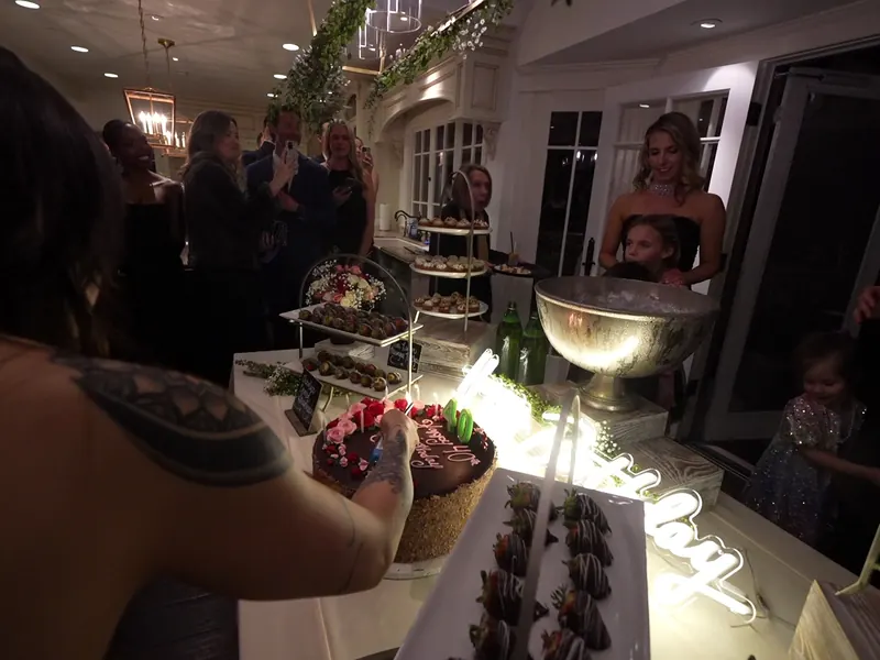 Dessert display beside a champagne bucket during a party at a Santa Rosa backyard party