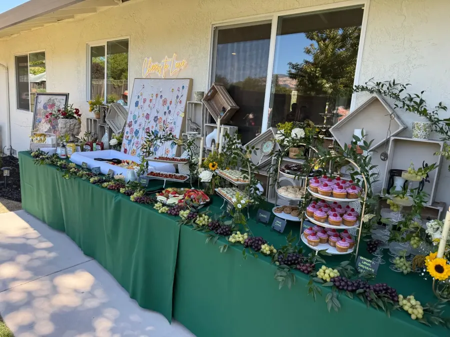 Guests raising glasses during cocktail hour at a Marin County wedding reception catered by Marin Catering Company